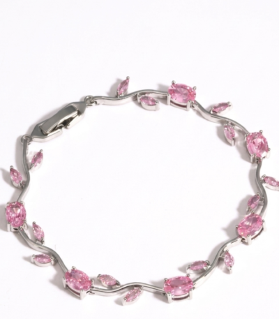 Pink Tulip Bracelet with oval pink stones, marquise-shaped accents, and silver-tone detailing on a white background.
