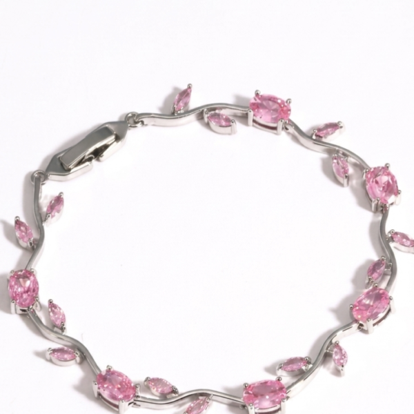 Pink Tulip Bracelet with oval pink stones, marquise-shaped accents, and silver-tone detailing on a white background.