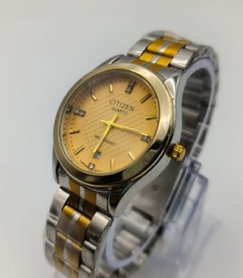 Two tone gold and silver quartz watch with champagne textured dial and metal bracelet by https://vastorastore.com/